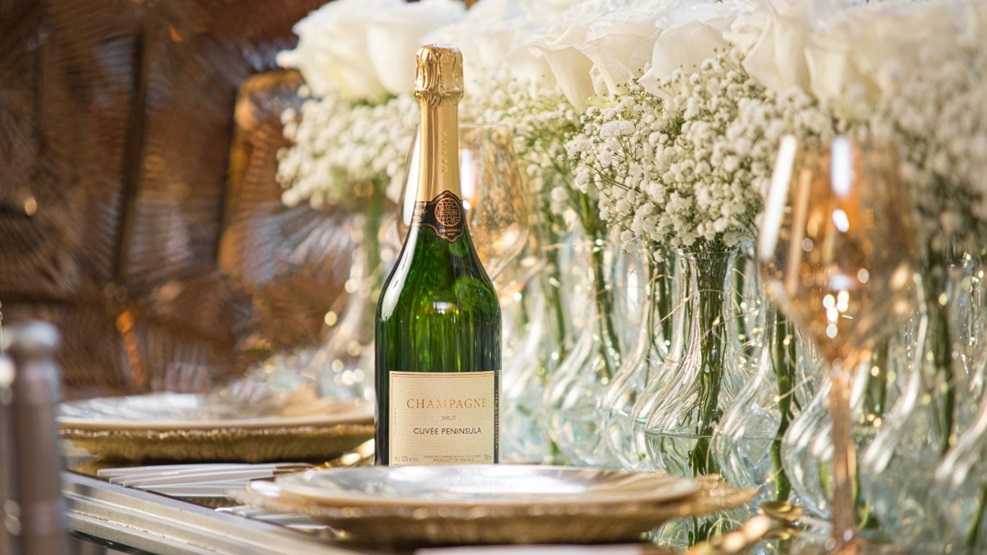 https://www.peninsula.com/-/media/images/manila/new/weddings/wedding-details/2023_the-peninsula-brut-champagne.jpg?mw=987&hash=669EE2F32A9FFB0A249773D1EC1BE50F